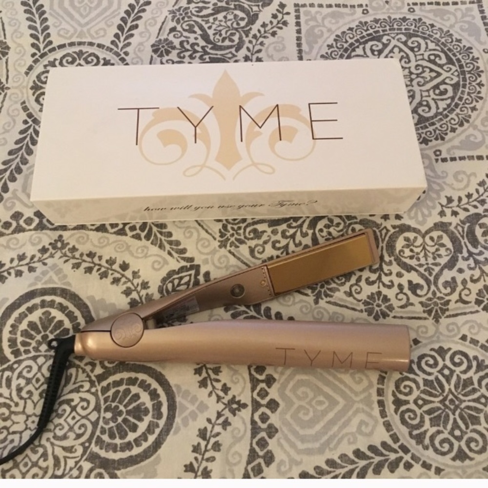 Tyme Iron new with sleeve and original box